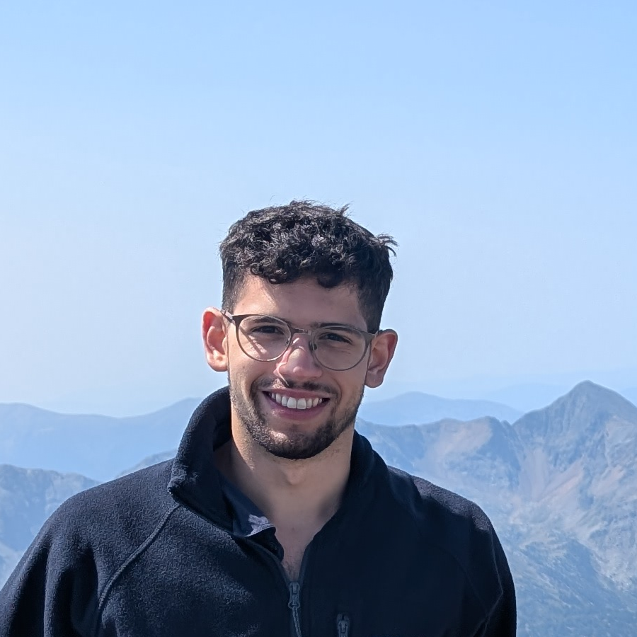 Dolev Franko on a mountain summit in the Pyrenees